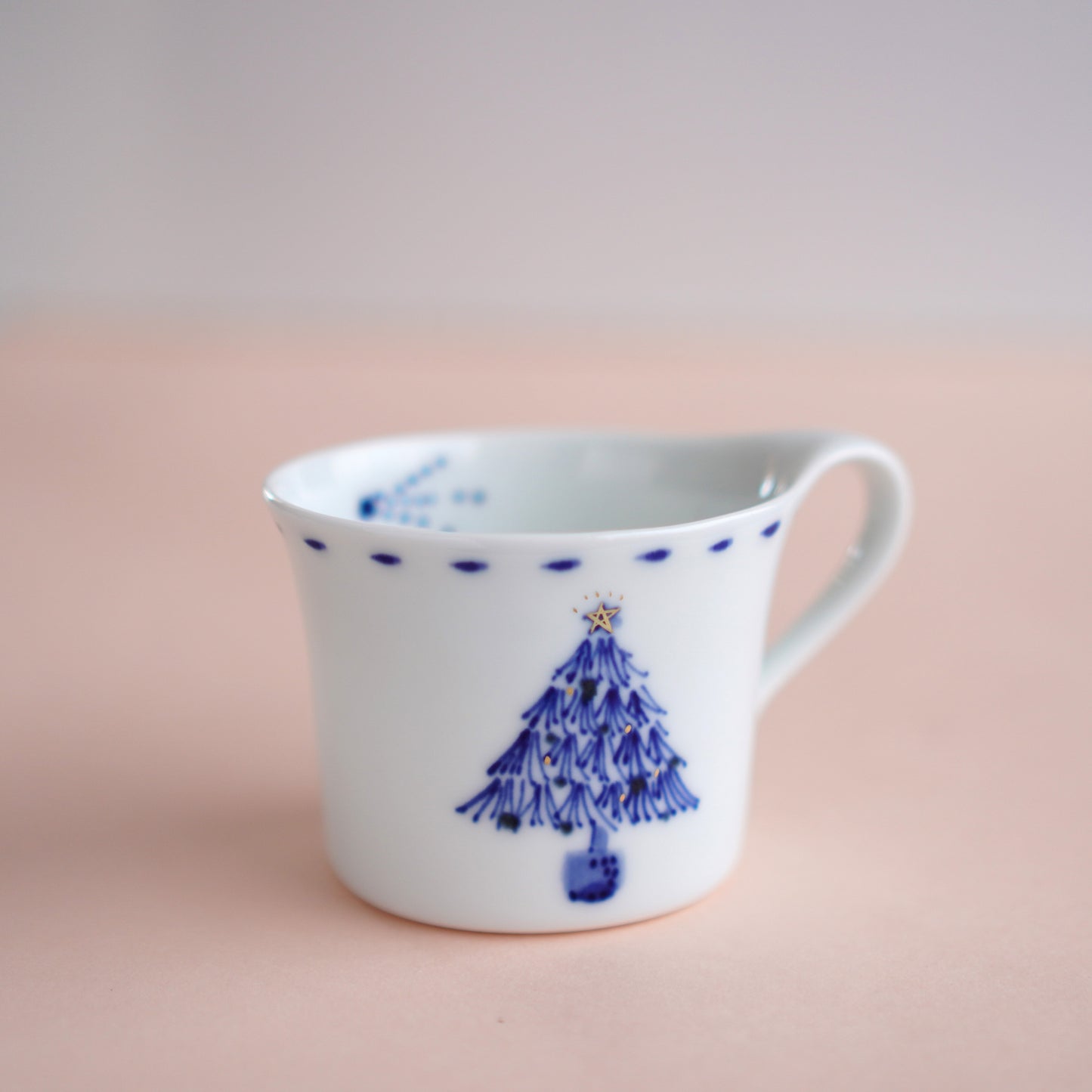 青いツリーのコーヒーカップ