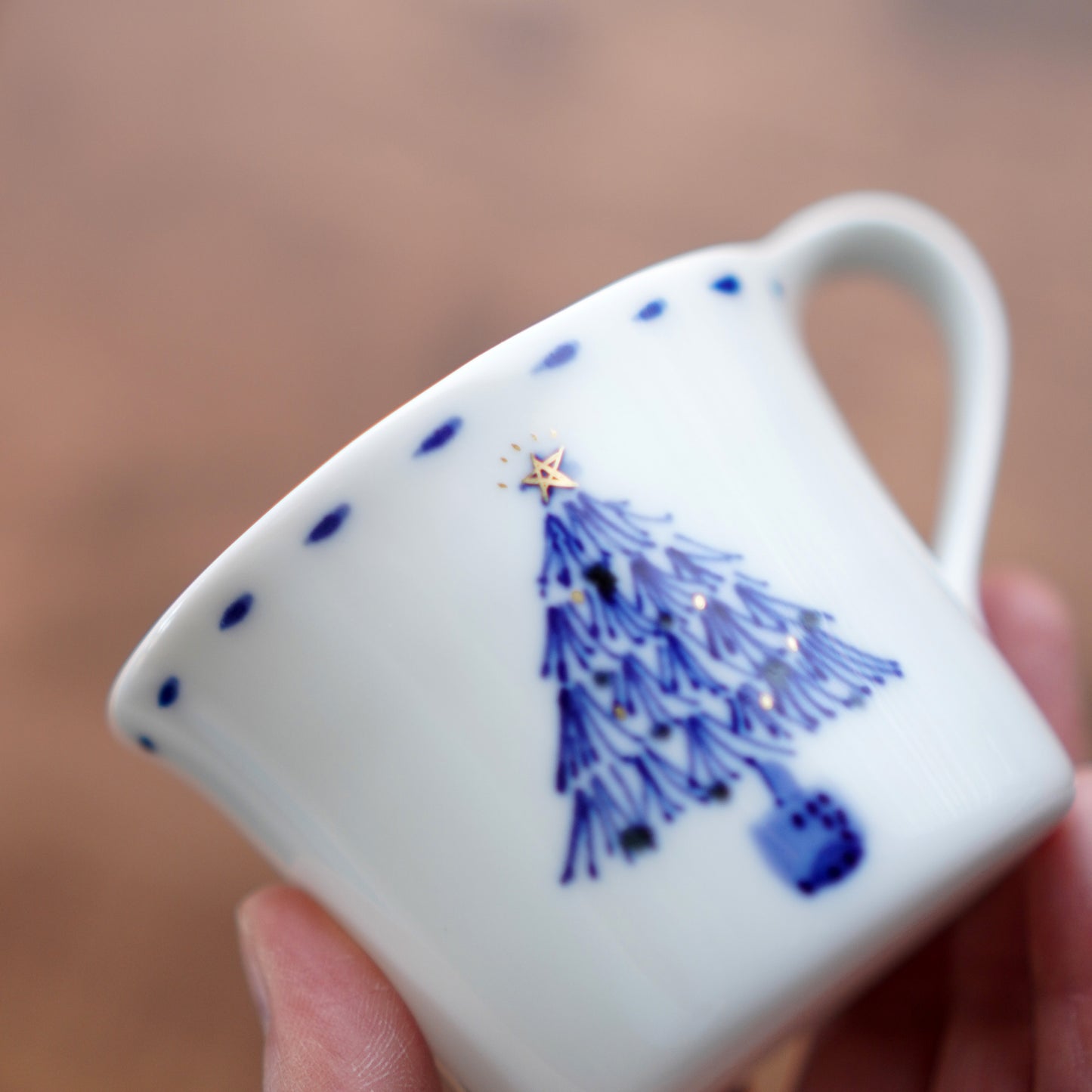 青いツリーのコーヒーカップ